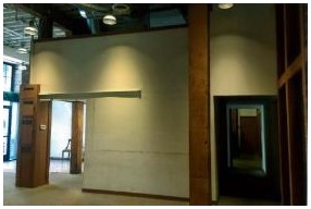 Before: interior view of entrance foyer before construction